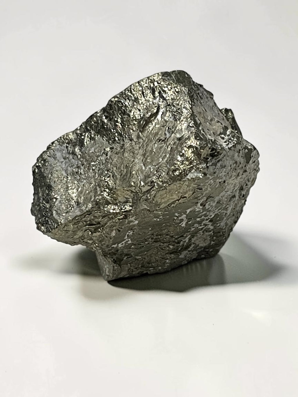 Angled view of Climax Mine pyrite specimen showing bright reflective crystalline texture