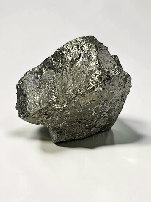 Angled view of Climax Mine pyrite specimen showing bright reflective crystalline texture